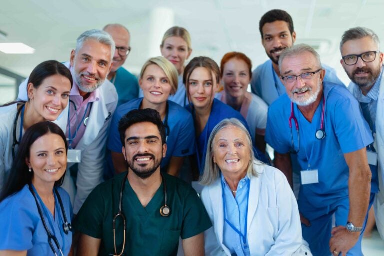 Portrait of happy doctors, nurses and other medical staff